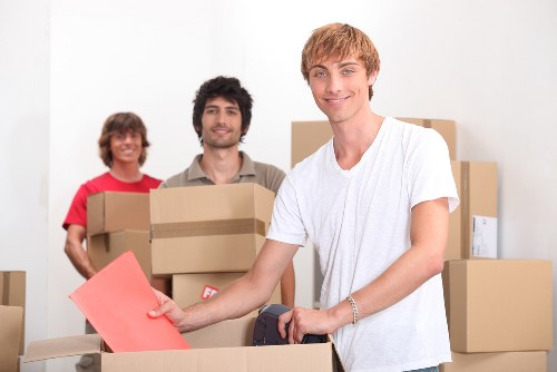 Loading household items into a removals van in Kingston